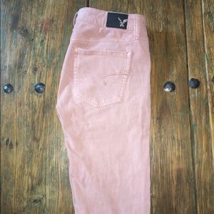 American Eagle light pink skinny jeans.