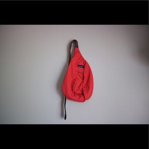 Kavu cross-body backpack bag.