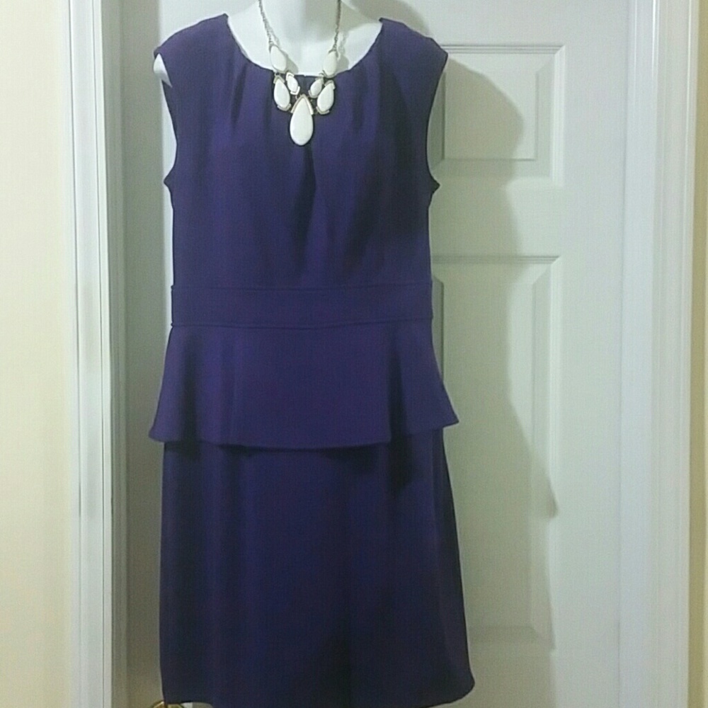 Purple sleeveless peplum dress