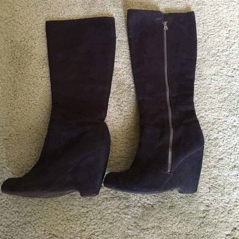 Black swede mid-calf wedge boots.