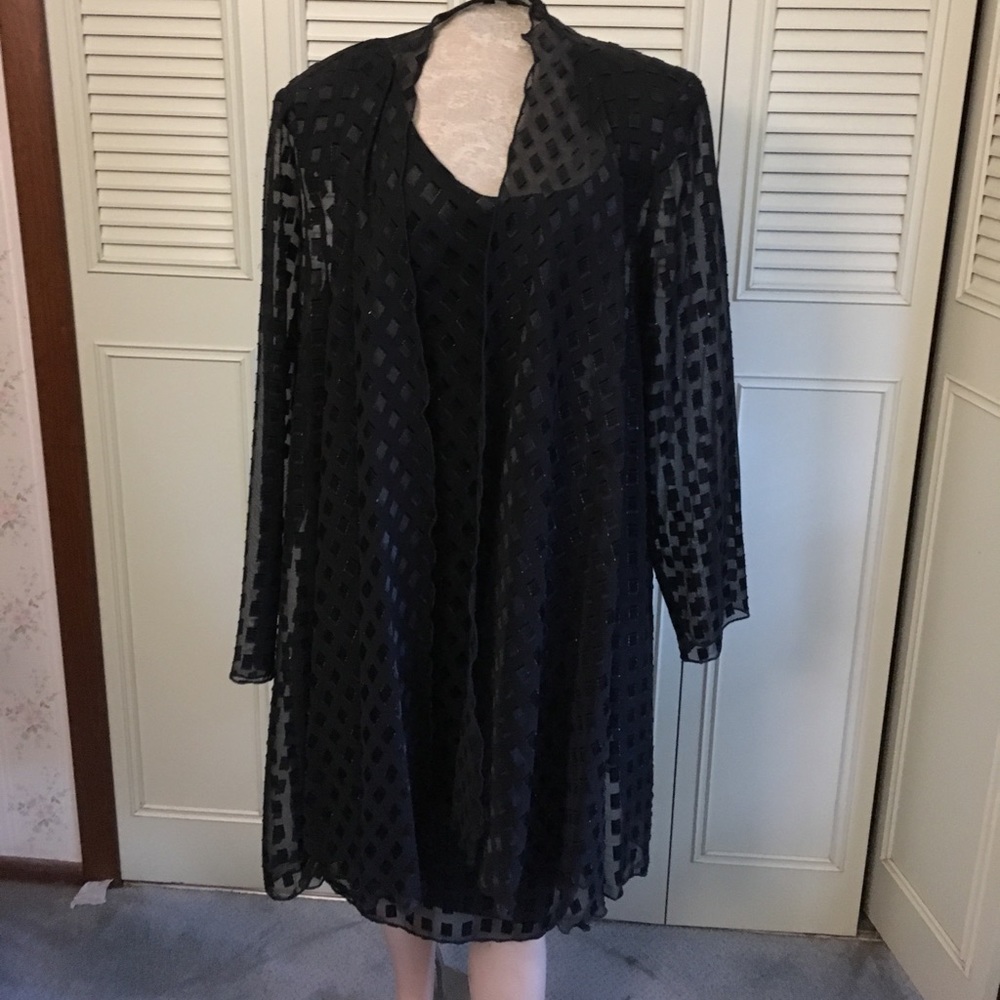 Black sleeveless cocktail dress with sheer jacket
