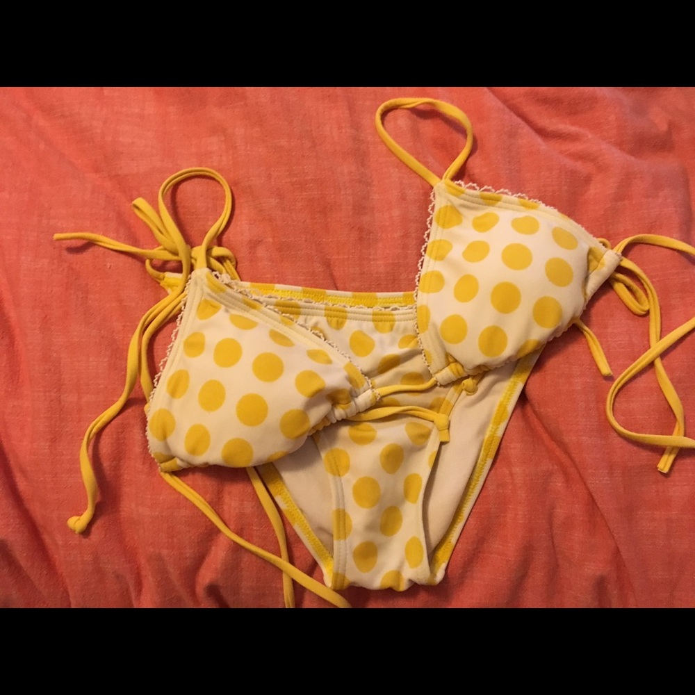 Teeny yellow polka dot bikini