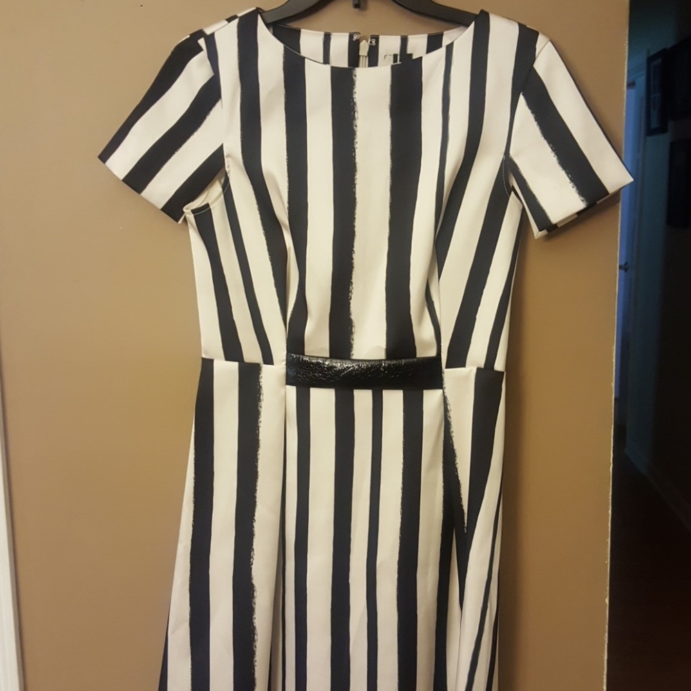 Satin cream and black knee-length dress