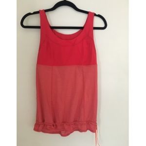 Red Lululemon exercise shirt with drawstring waist