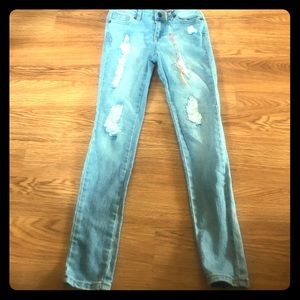 Little girls light denim skinny jeans.