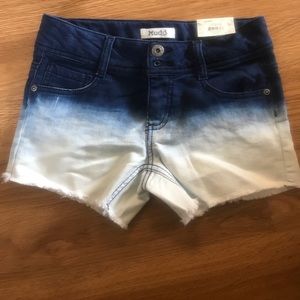 Little girls dark blue ombré shorts.
