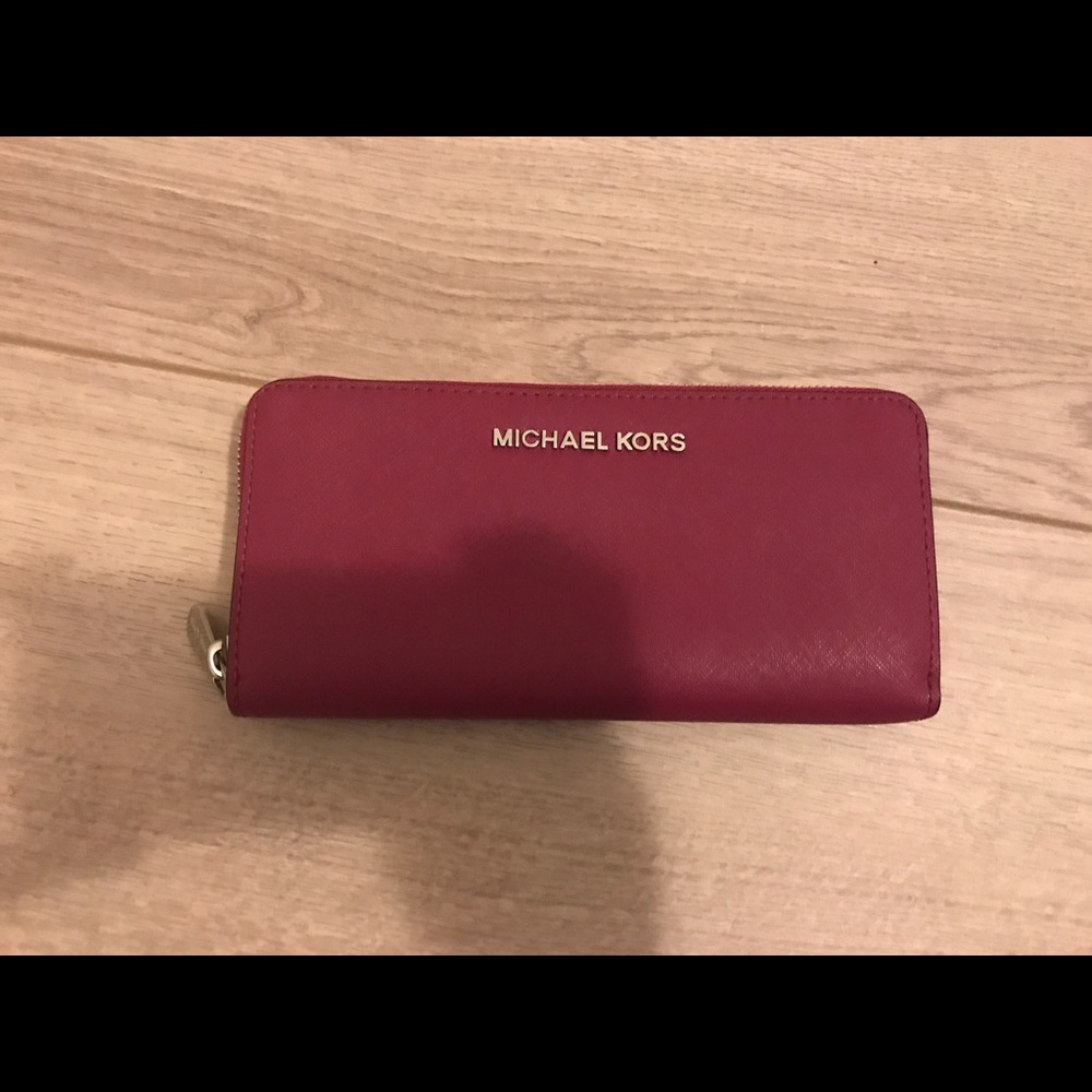 Michael Kors pink wallet/ clutch