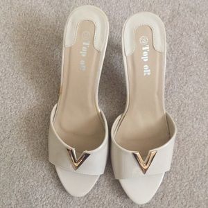 White patent leather slide heels
