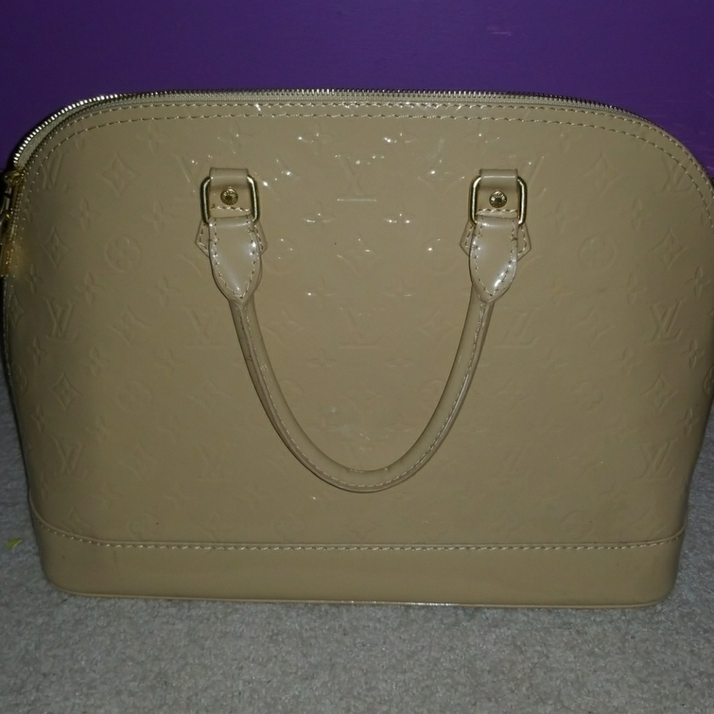 LV Nude patent leather bag