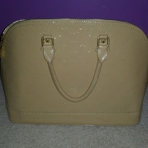 LV Nude patent leather bag