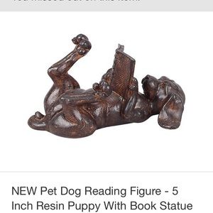 Reading dog figurine