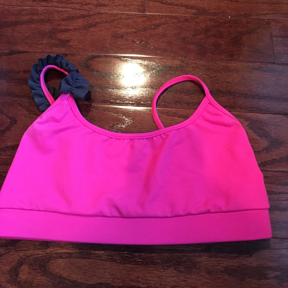 Jo & Jax one shoulder ruffle sports bra.
