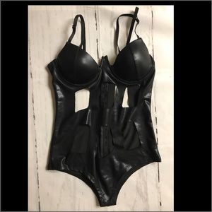 Black Body suit w/ sexy cut out.