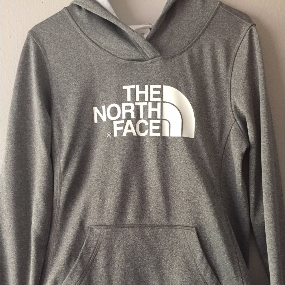 Grey women's Northface sweatshirt.