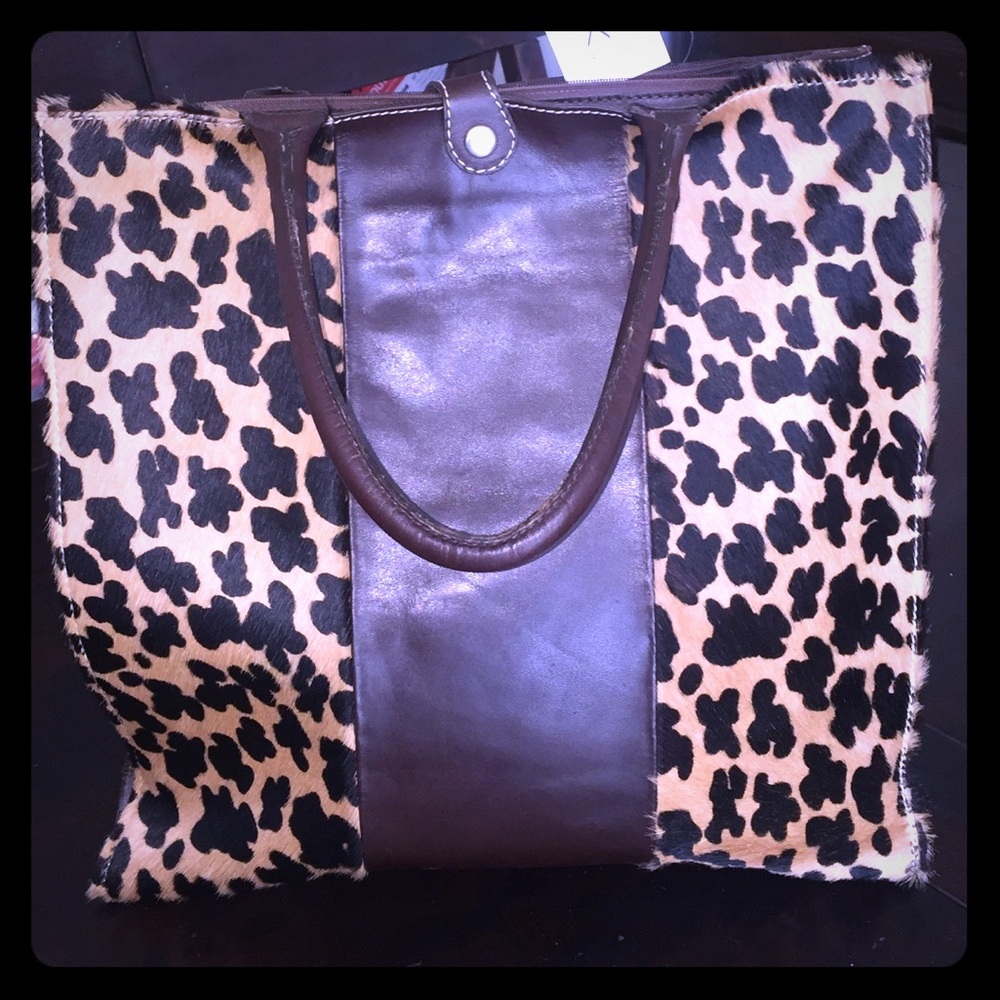 Real leather beautiful purse. Made in Spain. New