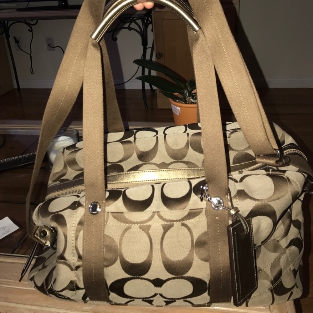 Coach voyage monogram duffle bag