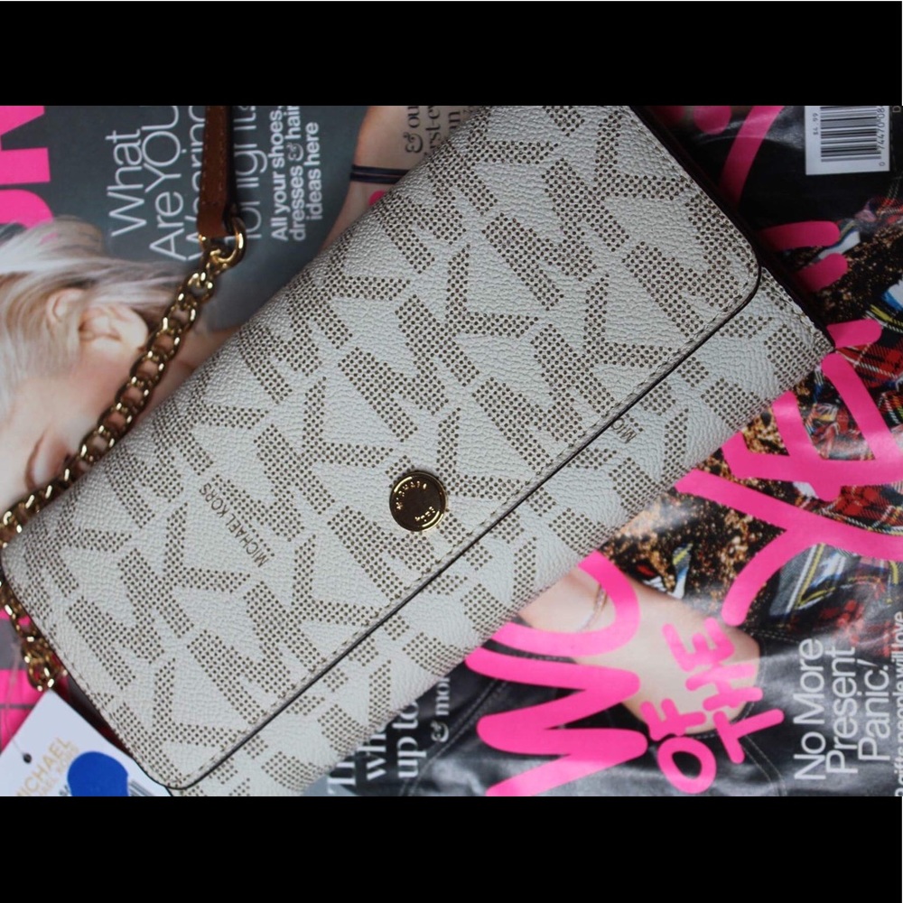 Michael Kors Signature Saffiano wallet on a chain
