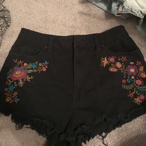 Black shorts with floral pattern