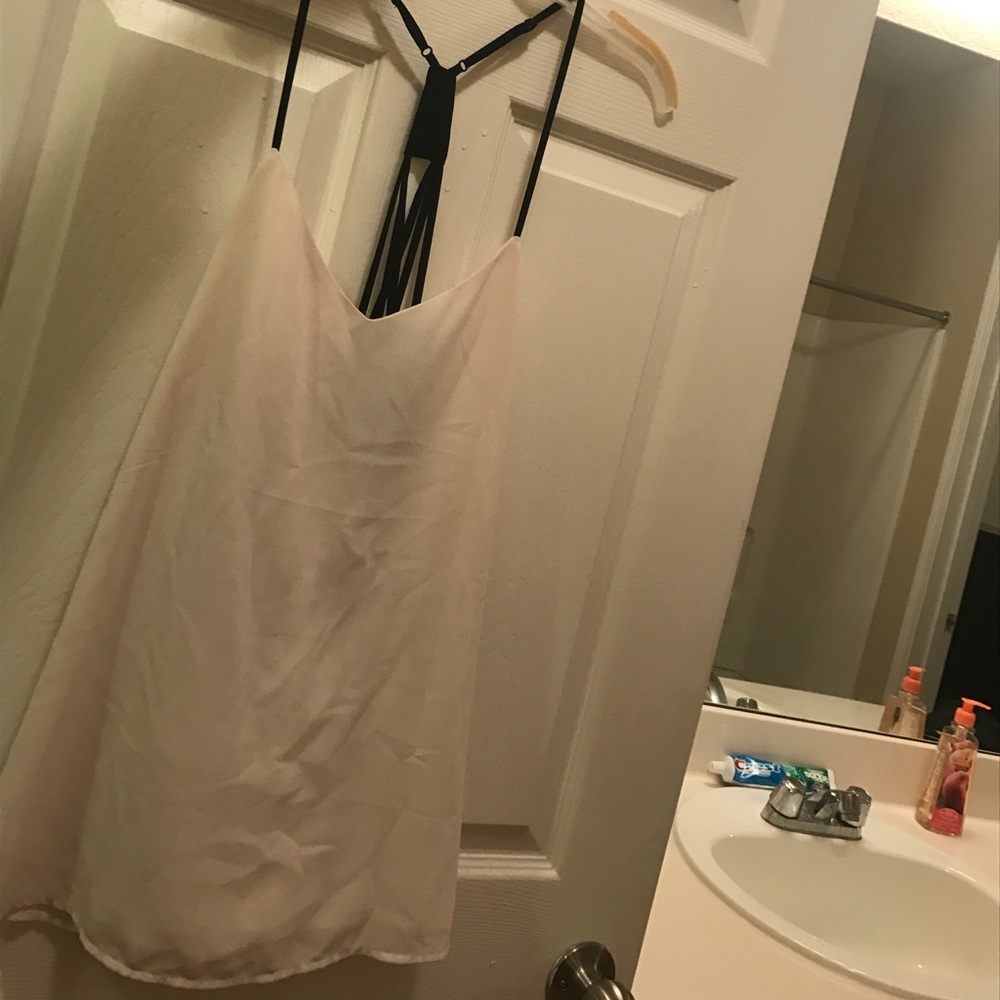 Spaghetti strapped shirt. RUNS SMALL