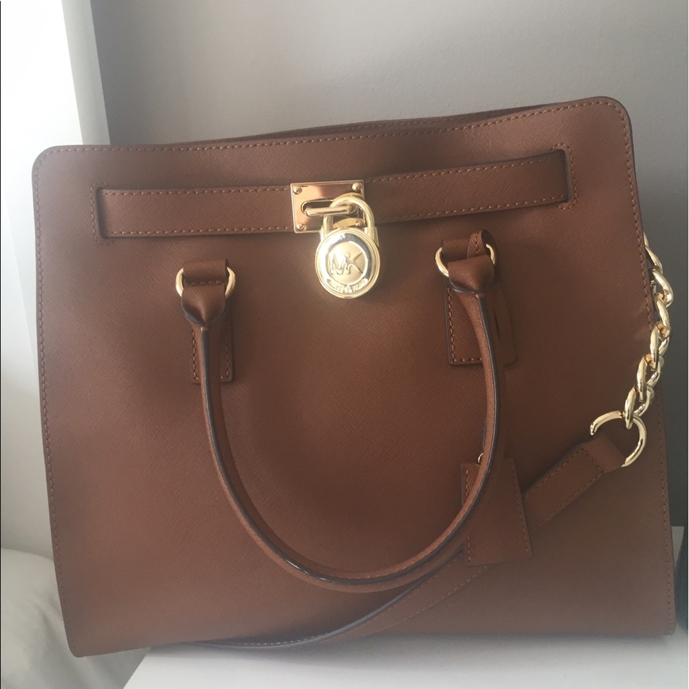 Real mk bag asking $300
