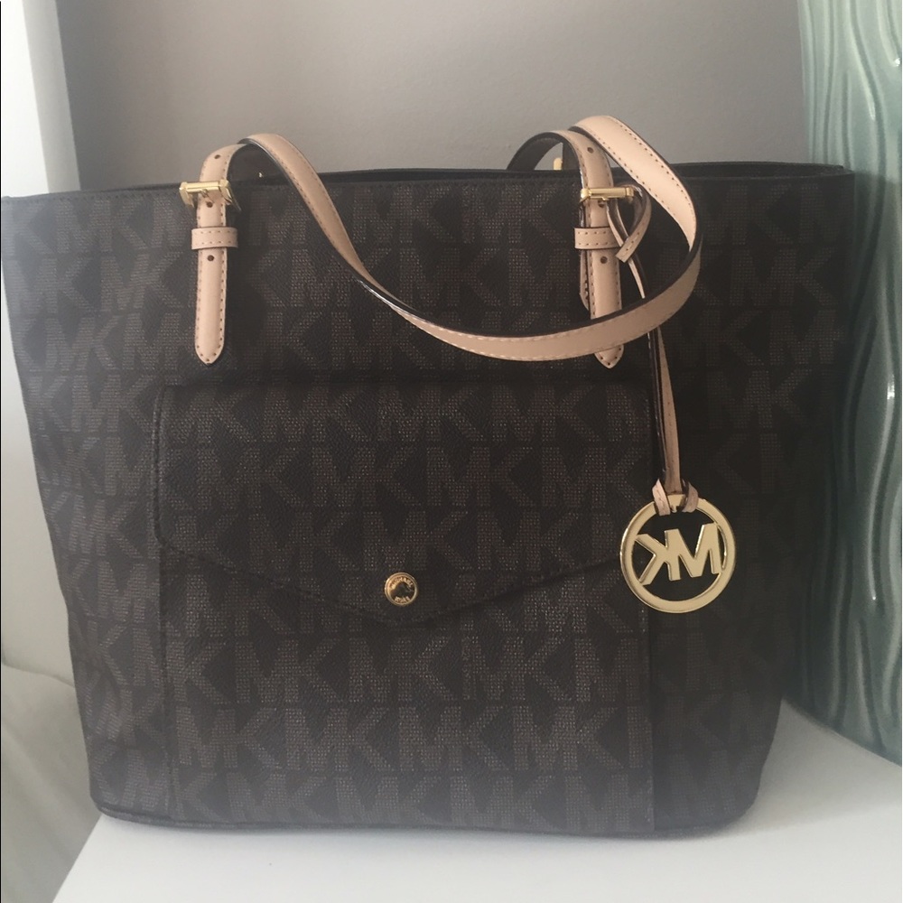 Real mk bags asking $180
