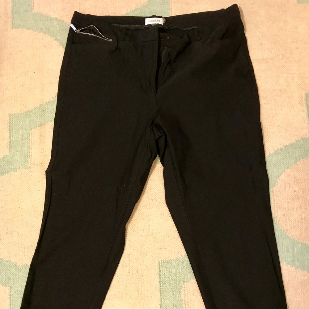 Skinny leg dress pants with zipper pocket