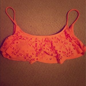 Orange rip curl bikini top with tribal cut outs