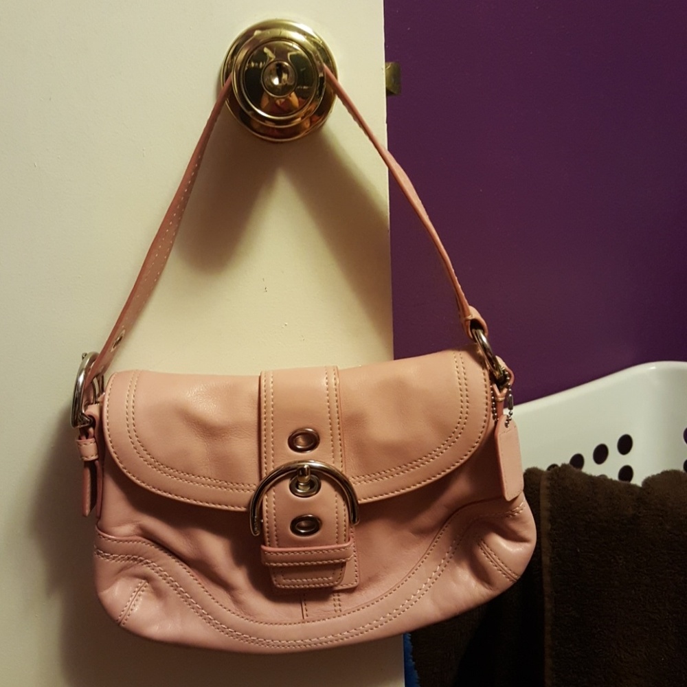 Small light pink coach purse
