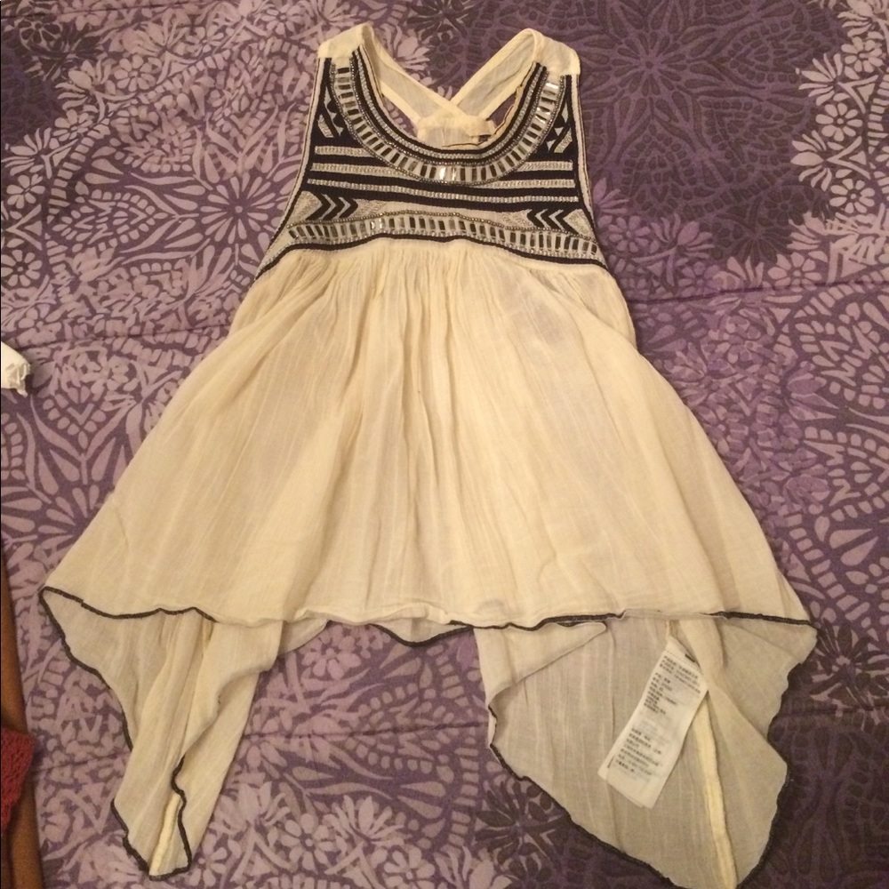 Beaded and threaded top