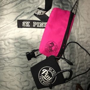 Hot pink fanny pack and black koozie