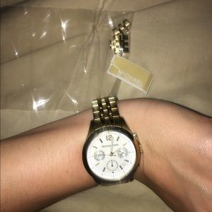 Gold michael kors watch with links