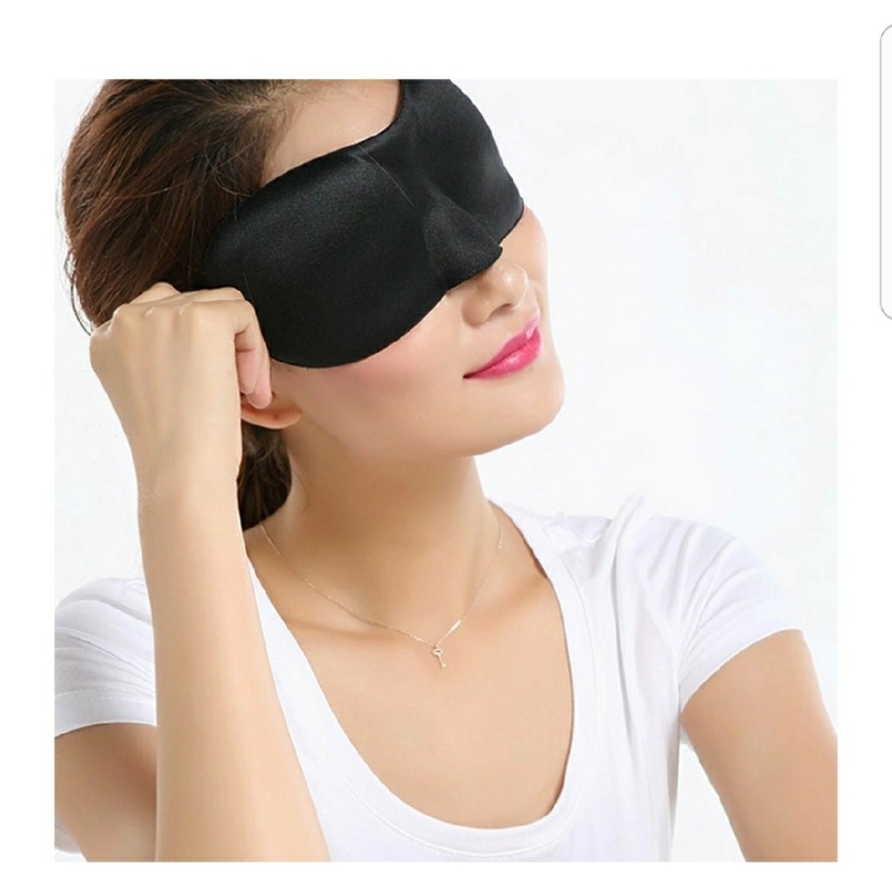 Contoured sleeping mask