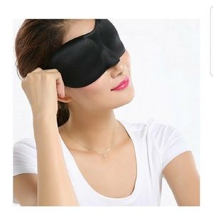 Contoured sleeping mask