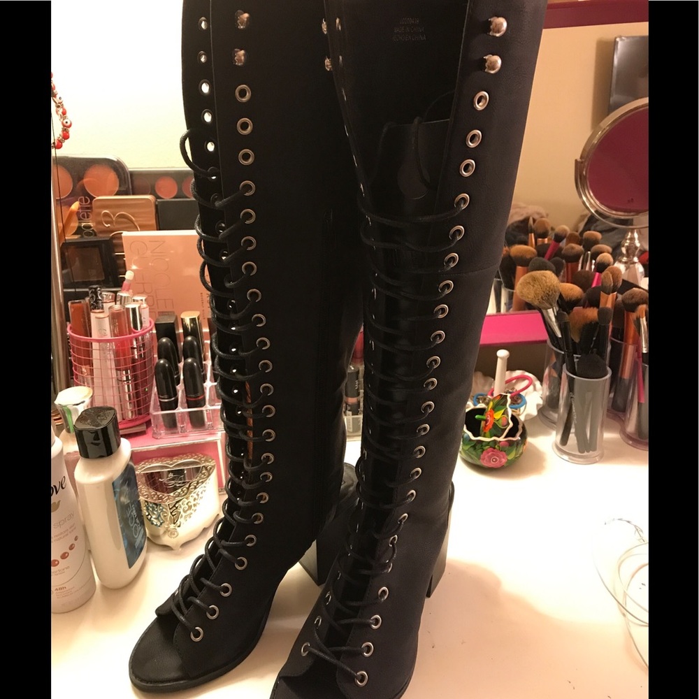 Under the knee high boots