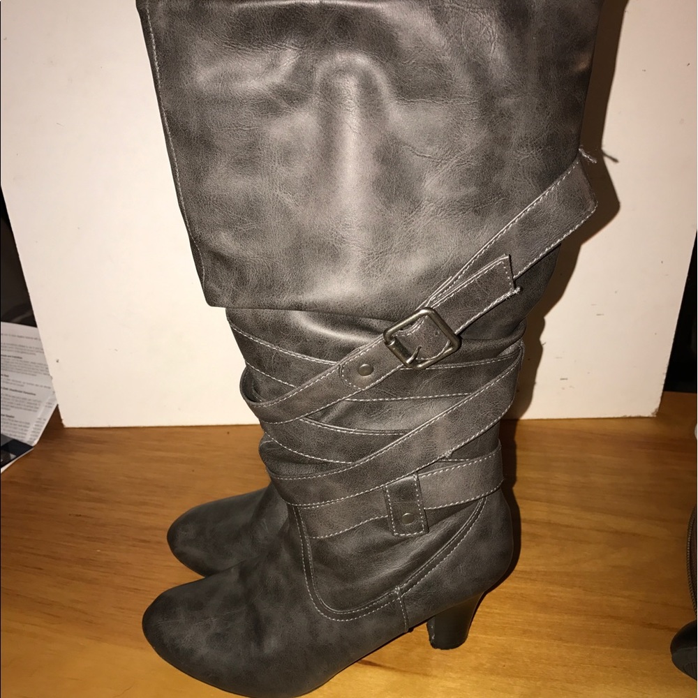 Grey heeled knee high heeled boots