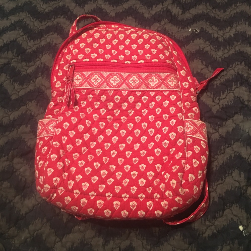 Cleaning closet making room for baby clothes