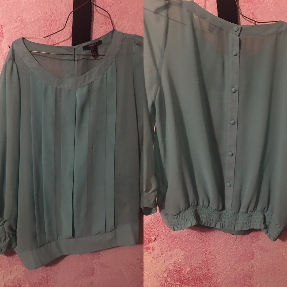 Blue ruffled bottom shirt *half sleeved*
