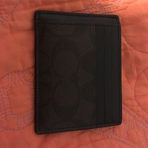 Coach Men's wallet. New with tags. Black and brown