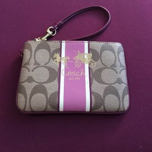 Pink/purple wristlet from coach