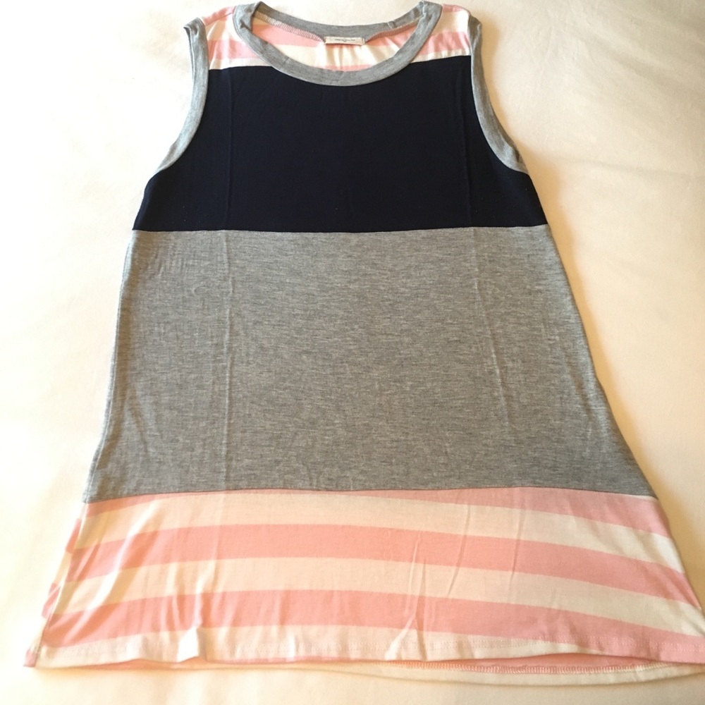 Worn once, boutique sleeveless top, excellent cond