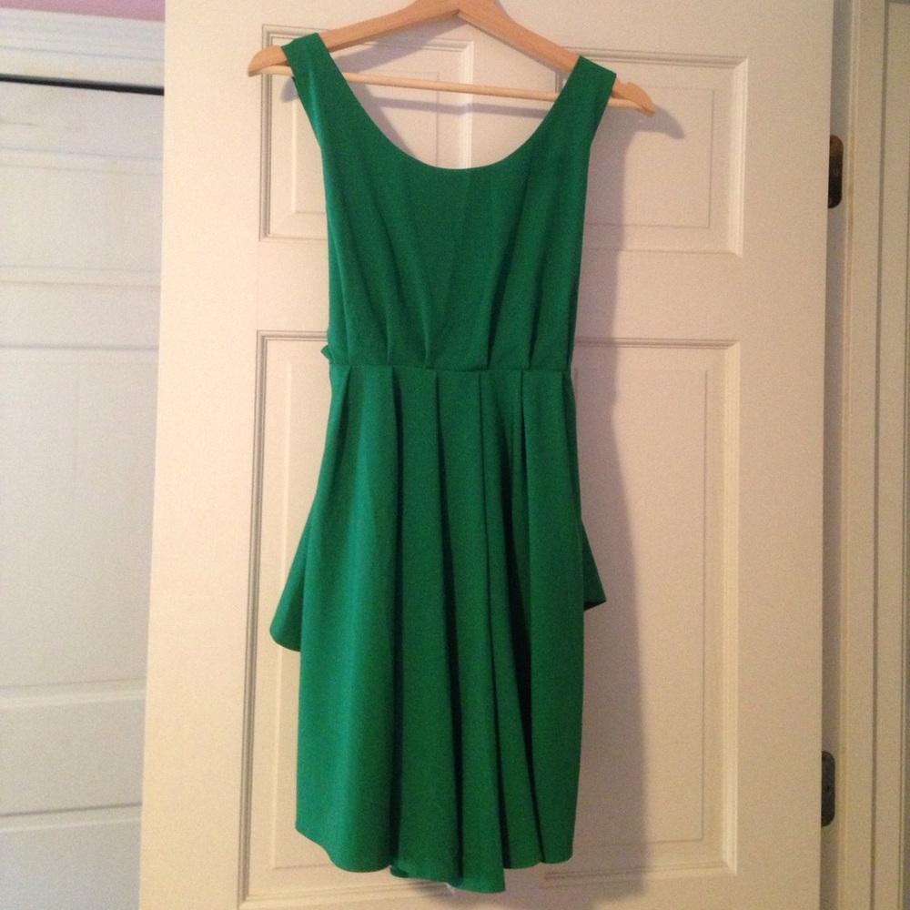 Green open back dress