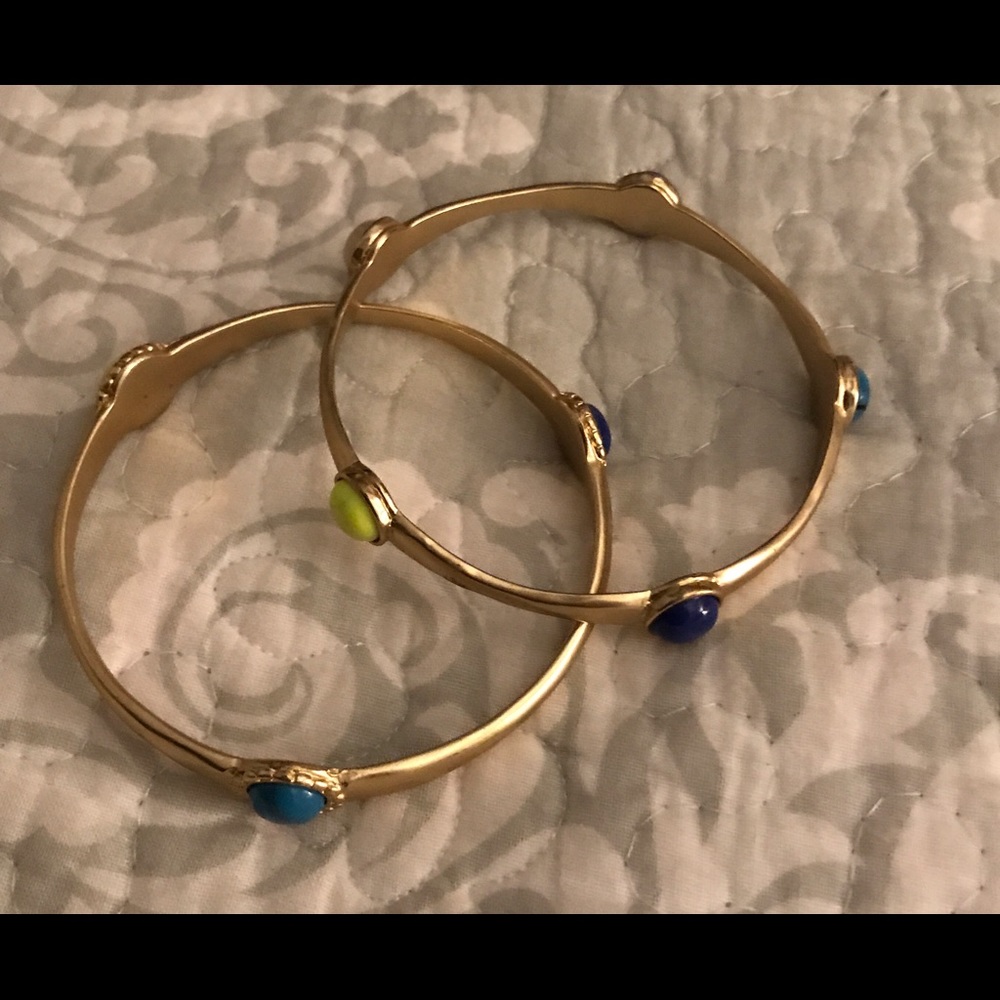2 Gold Toned hammered Brass bracelets