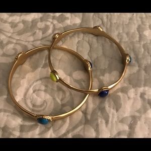 2 Gold Toned hammered Brass bracelets