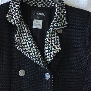 Knit Chanel jacket with silver sequin trim.