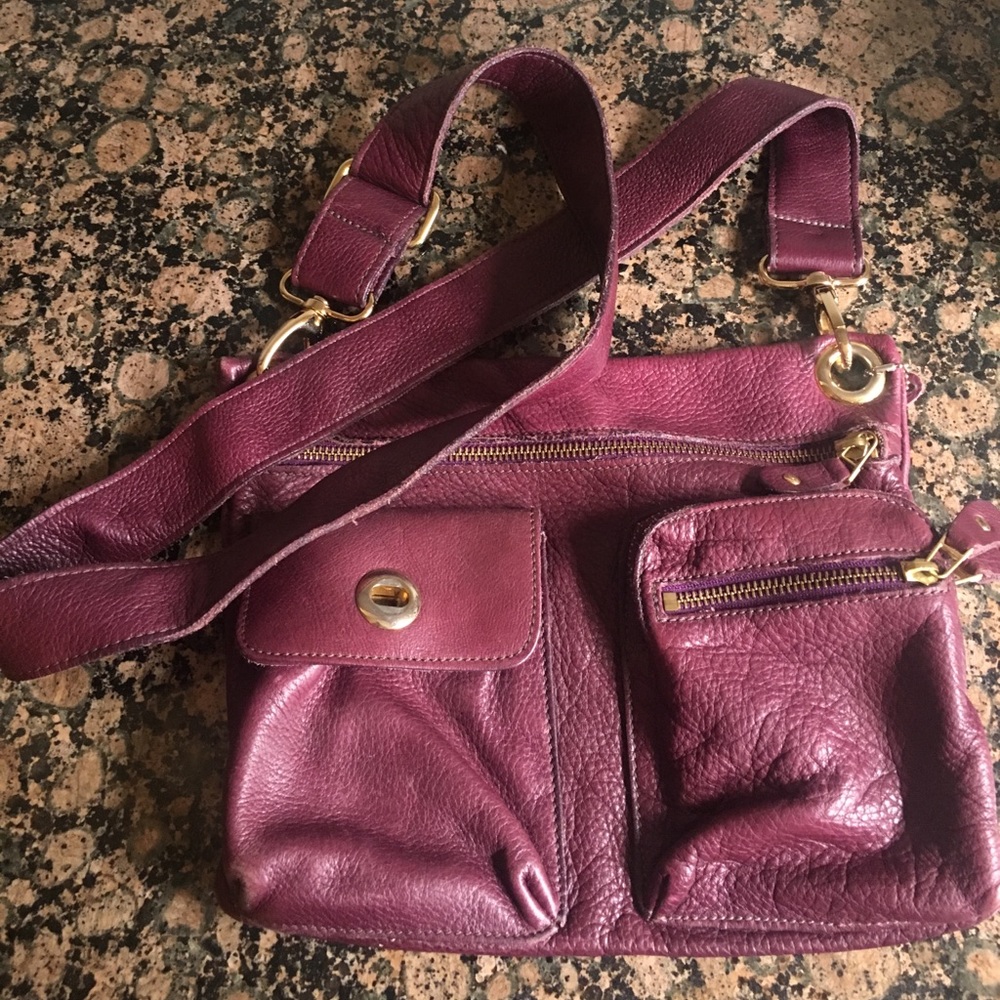 Purple leather Roots cross body bag
