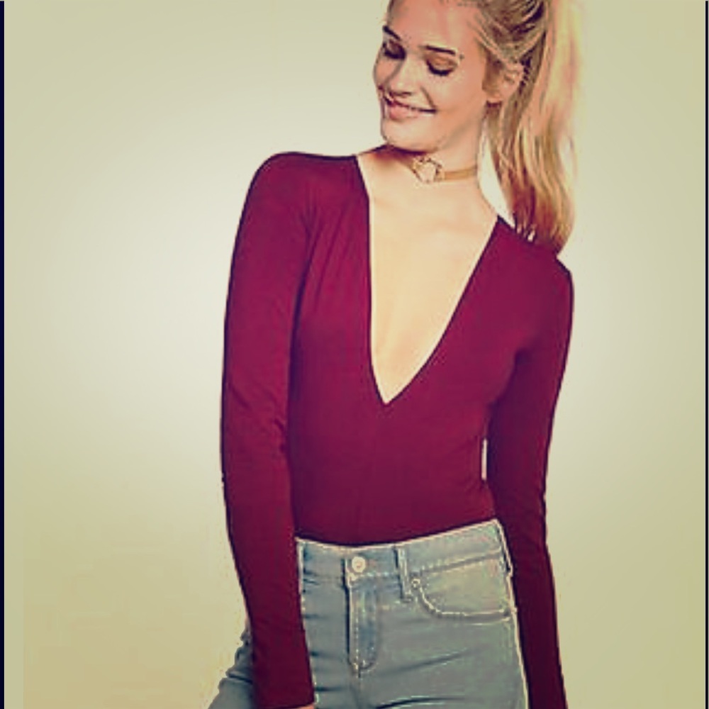 NWT Express Deep V body suit