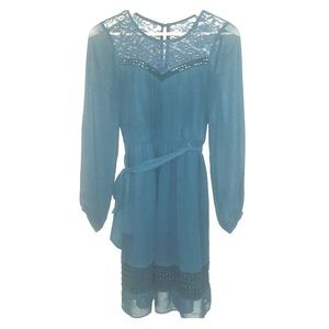 A long sleeve, chiffon dress.