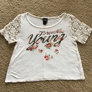 Daytrip top with lace sleeves. Size XS