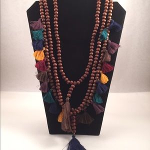 Three strand tassel necklace