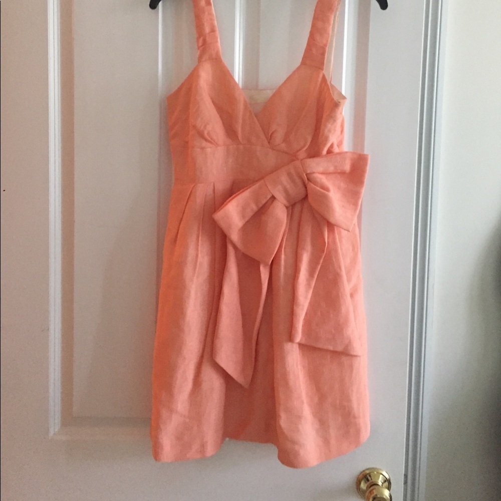 Peach dress with bow design
